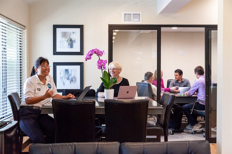 Meeting in a glass-walled room at Zipdesk